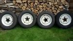4 stalen landrover velgen met banden